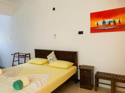 Center Point Villa Unawatunaにあるベッド