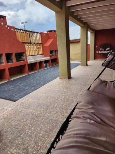 a bed on the roof of a building at El 5to Elemento in La Falda