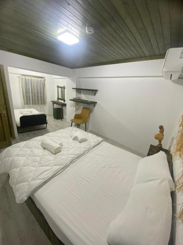 Ein Bett oder Betten in einem Zimmer der Unterkunft Scala Otel