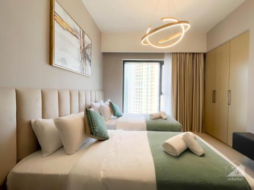 Postel nebo postele na pokoji v ubytování Luxury Burj Royale Apt Balcony Burj Khalifa View