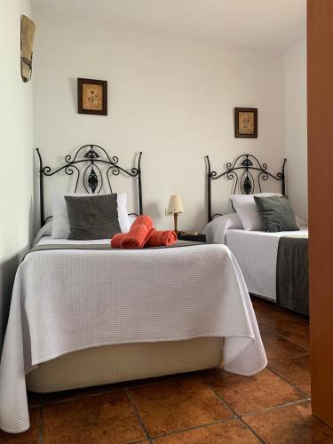 Postel nebo postele na pokoji v ubytování Casa Olmos