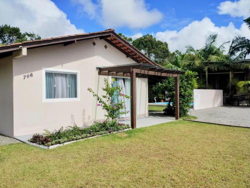 Taman di luar Férias Perfeitas, Praia e Piscina