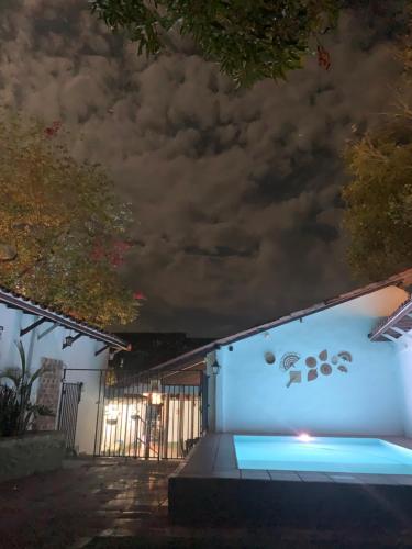 a night view of a house with a dark sky at Casa hotel Dulce Candelaria in Santa Fe de Antioquia