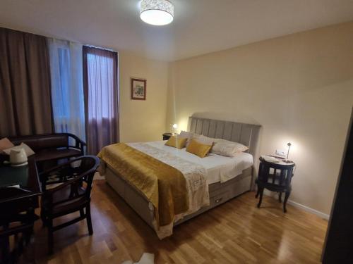 Postel nebo postele na pokoji v ubytování La-La Rooms