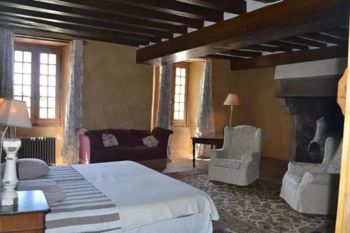 Ένα ή περισσότερα κρεβάτια σε δωμάτιο στο Domaine des vaulx - locations de cabanes insolites