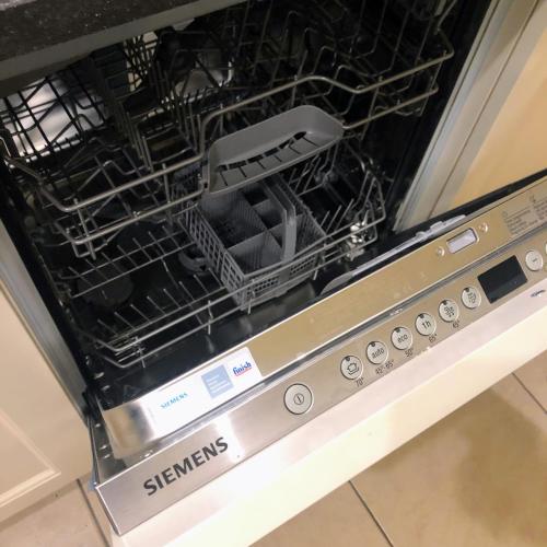 Una cocina o zona de cocina en La Vie sur mer - appartement zijdelings zeezicht Mariakerke