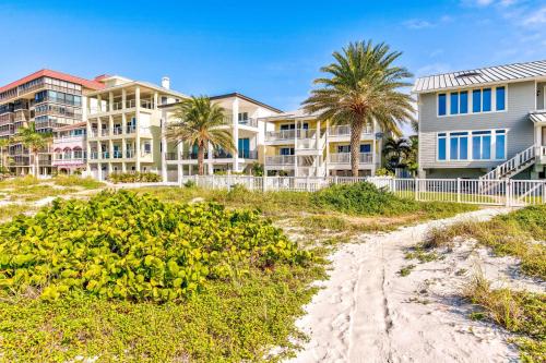a view of the apartment buildings from the beach at Sunset Villas 3 in Clearwater Beach