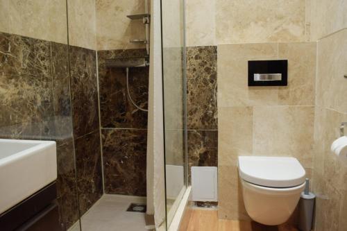 Koupelna v ubytování Osborne Aparthotel