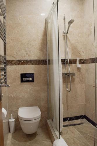 Koupelna v ubytování Osborne Aparthotel