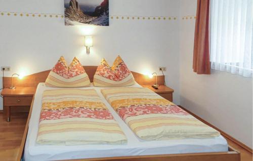 Posteľ alebo postele v izbe v ubytovaní Gemuetliche Ferienwohnung