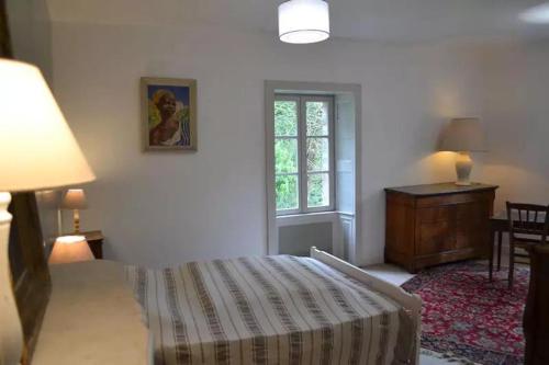 Ένα ή περισσότερα κρεβάτια σε δωμάτιο στο Domaine des vaulx - locations de cabanes insolites
