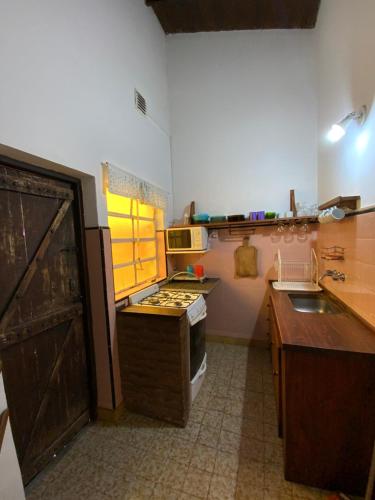 Dapur atau dapur kecil di Complejo Quimey alojamiento familiar