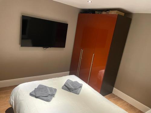 Un pat sau paturi într-o cameră la Bedroom 4