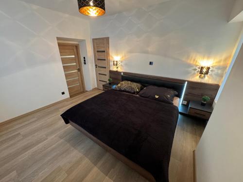 Voodi või voodid majutusasutuse Apartmán Alfa toas
