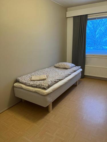 Postel nebo postele na pokoji v ubytování Jänkä Room