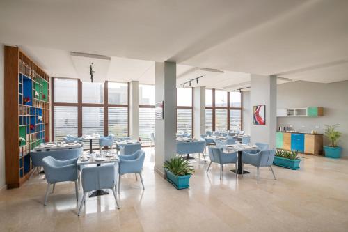 Posezení v ubytování Dhara Residence E2 Lodge Hotel