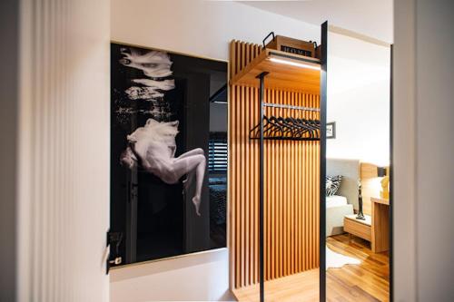 Ένα ή περισσότερα κρεβάτια σε δωμάτιο στο Apartman Joe