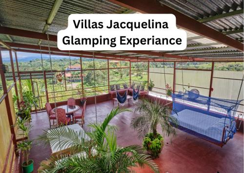 a glass house with a swinging experience at Villas Jacquelina in Quepos