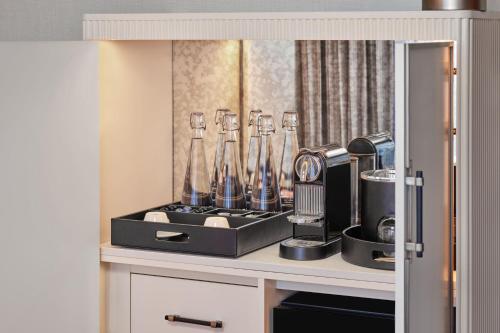 a kitchen with a counter with utensils on it at The Ritz-Carlton, Lake Tahoe in Truckee
