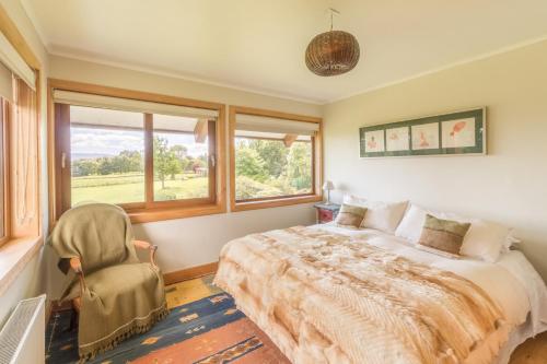 Postel nebo postele na pokoji v ubytování B&B Puerto Varas Playa Venado