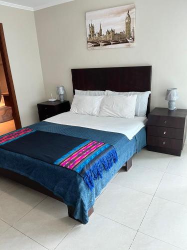 Postel nebo postele na pokoji v ubytování Puerto Santa Ana Suites Guayaquil