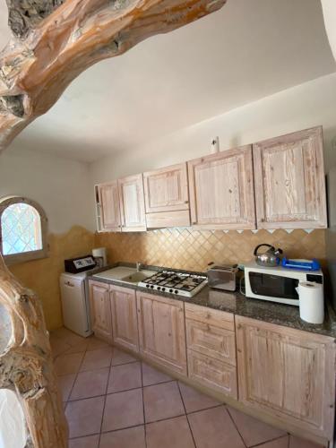 Η κουζίνα ή μικρή κουζίνα στο Appartamento Deluxe in Villa Renè