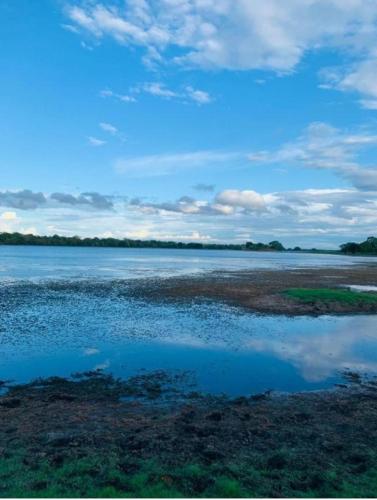a view of a large body of water at ARANI HOMESTAY in Polonnaruwa