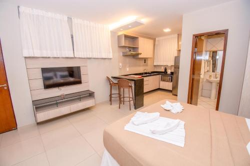 Η κουζίνα ή μικρή κουζίνα στο Residencial BoaVida