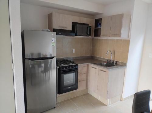 Fotografie z fotogalerie ubytování Casa de descanso en residencial v destinaci Tlayecac