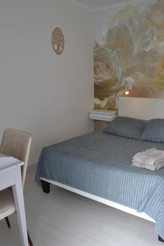 Ein Bett oder Betten in einem Zimmer der Unterkunft Atlantic Hôtel