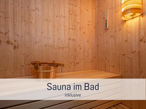 a room with a sauna in badadobeadobe sidx at Ferienhaus Küstenzauber Kalifornien - mit Hund - komplett eingezäunter großer Garten - Sauna und Kamin - im Sommer Strandkorb inklusive in Schönberg in Holstein