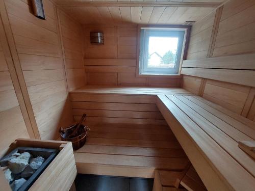 an inside view of a sauna with a window at VILLA DANUTA- WISELKA, direct at National Park, big garden, 4 bedrooms, private SAUNA in Wisełka