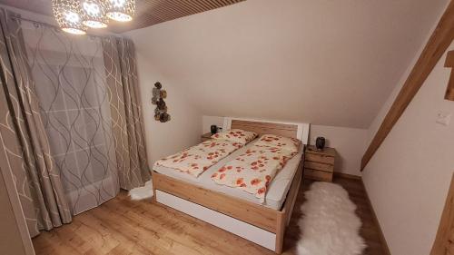 Cama o camas de una habitación en Landgut DIE AUSZEIT - Erholung am Berg 1300m