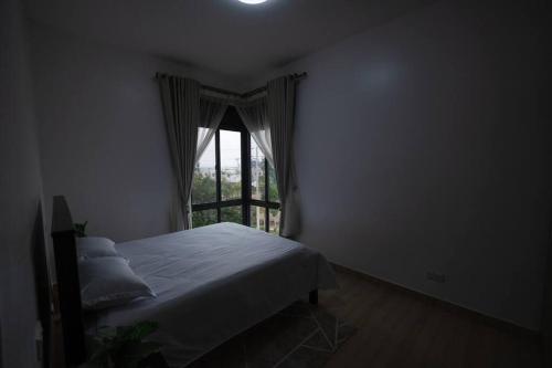 Katil atau katil-katil dalam bilik di Lake Home in Entebbe 1