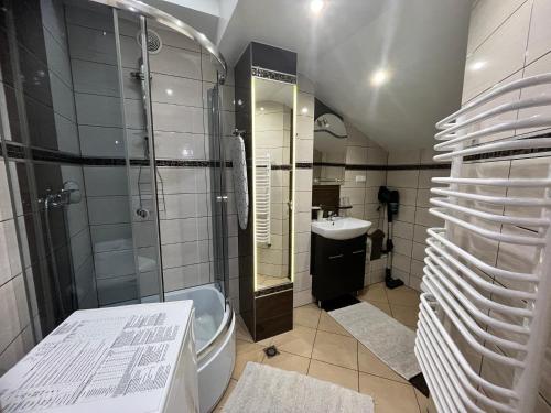 Kúpeľňa v ubytovaní Apartamenty u Grażyny