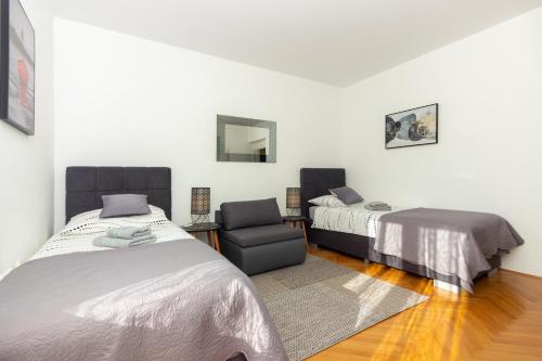 Posteľ alebo postele v izbe v ubytovaní Apartment Fortunella