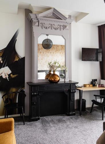 a table with a pumpkin on it in a room at Boutique Hotel View in Amsterdam