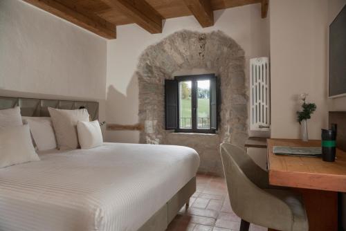 Postel nebo postele na pokoji v ubytování Monastero Sant'Alberico Relais