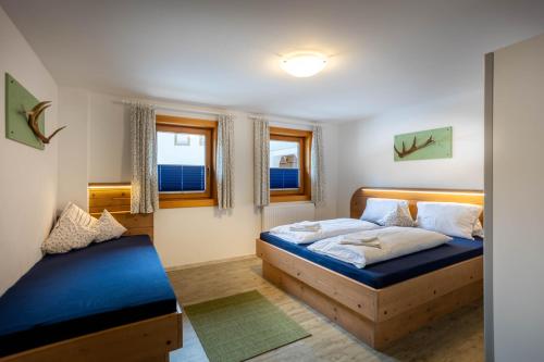 Postelja oz. postelje v sobi nastanitve Ferienwohnung Brandegg