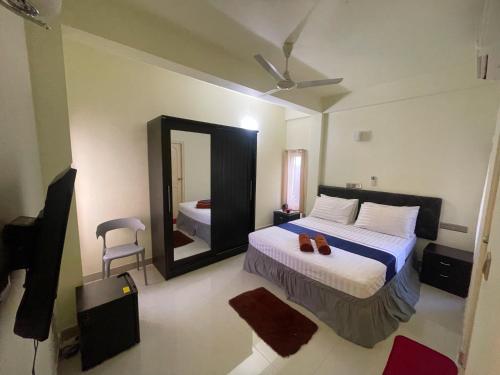 Oren Hotel Maldivesにあるベッド