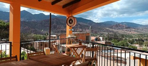 a balcony with a view of the mountains at Casa Mamani in Tilcara