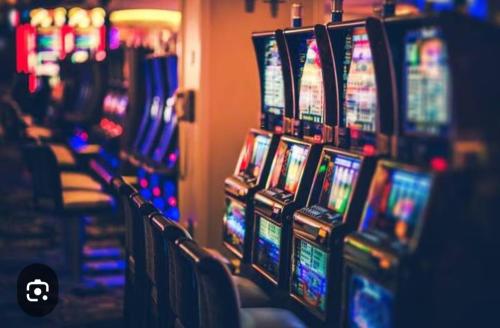 a bunch of slot machines in a casino at Cozy Cute Home 2nd floor pay at the property and we have many method of payments just ask us in Fajardo