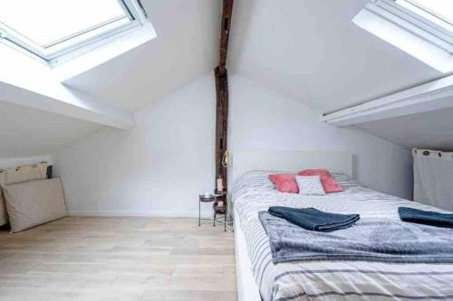 Postel nebo postele na pokoji v ubytování Duplex 45m2 -Zac L’Oreal - Palais de Justice Paris