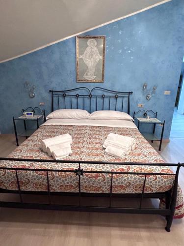Katil atau katil-katil dalam bilik di Appartamento Assisi