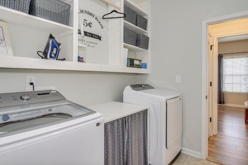 a laundry room with a washer and dryer at Our Corner Cottage in Aiken