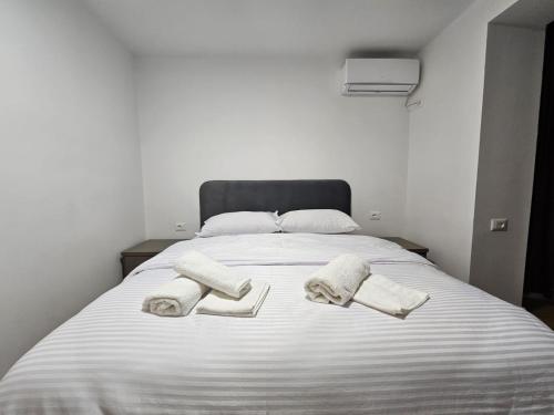 Ένα ή περισσότερα κρεβάτια σε δωμάτιο στο Elois Luxury Apartment