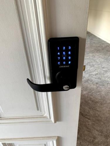 a close up of a remote control on a door at Shepparton House in Shepparton