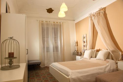 En eller flere senge i et værelse på Vacanze Palermitane