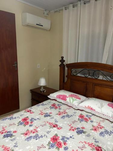 Кровать или кровати в номере casa familiar da gilvana