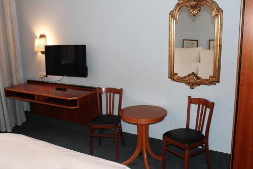 Μια τηλεόραση ή/και κέντρο ψυχαγωγίας στο Hotel Mozart Bonn